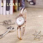 Bvlgari-48 人氣百搭新款土豪金白底鑲鑽藍寶石鏡面鋼間陶瓷女士石英腕錶