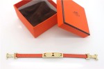 HERMES 00114 愛馬仕朋克鉚釘橙色十字紋金面手鐲手帶