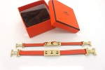 HERMES 00107 愛馬仕朋克鉚釘橙色平紋金面手鐲手帶