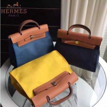 HERMES-0007-3 時尚新款herbag系列原單寶藍色帆布配土黃色牛皮大號手提單肩包