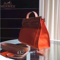 HERMES-0007-6 時尚新款herbag系列原單橙色帆布配土黃色牛皮大號手提單肩包