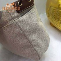 HERMES-00034 時尚輕便實用帆布配牛皮束口袋收納袋化妝包