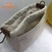 HERMES-00034 時尚輕便實用帆布配牛皮束口袋收納袋化妝包