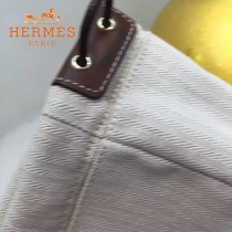 HERMES-00034 時尚輕便實用帆布配牛皮束口袋收納袋化妝包