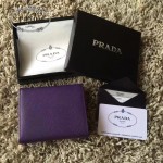 PRADA 1M0176-13 人氣經典款女士原單紫色十字紋短款三折錢包