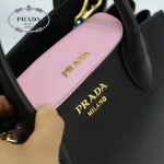 PRADA 1BA071-2 甜美淑女風黑色拼粉原版十字紋迷你風琴包