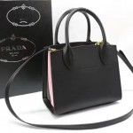 PRADA 1BA071-2 甜美淑女風黑色拼粉原版十字紋迷你風琴包