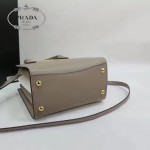 PRADA 1BA071-4 甜美淑女風灰色拼白原版十字紋迷你風琴包